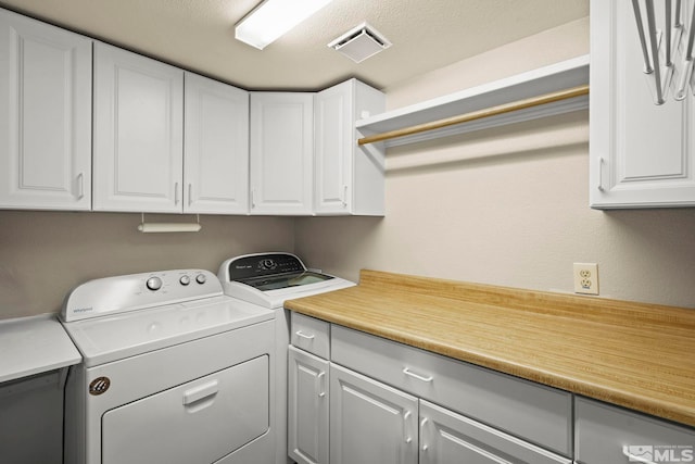 12880 Roseview Ln, Reno, NV 89511 - laundry area with cabinet space and independent washer and dryer