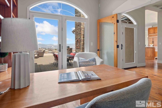 1005 Desert Jewel Ct, Reno, NV 89511 - dining space featuring french doors and wood finished floors
