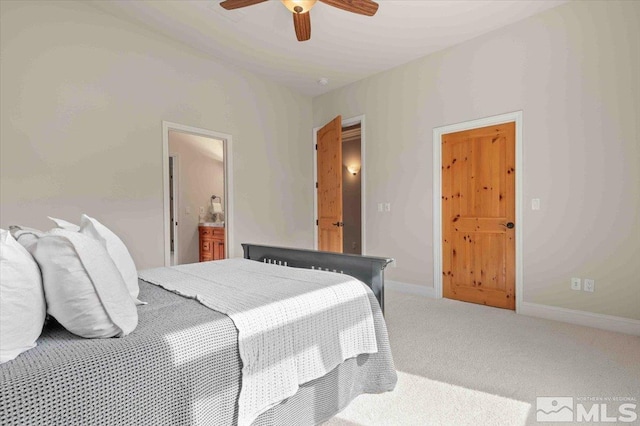 1005 Desert Jewel Ct, Reno, NV 89511 - carpeted bedroom with baseboards, ensuite bath, and a ceiling fan