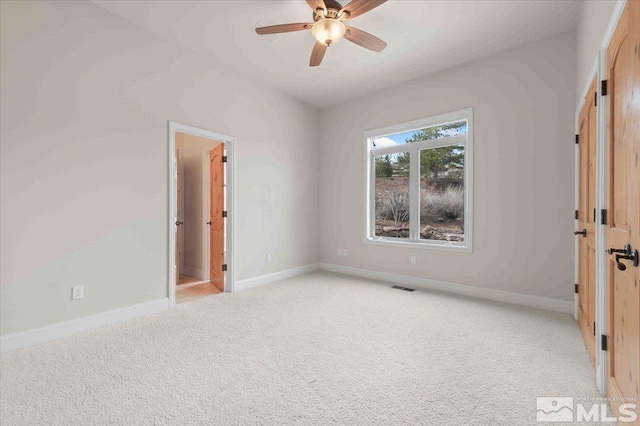 1005 Desert Jewel Ct, Reno, NV 89511 - unfurnished bedroom featuring light colored carpet, baseboards, and ceiling fan