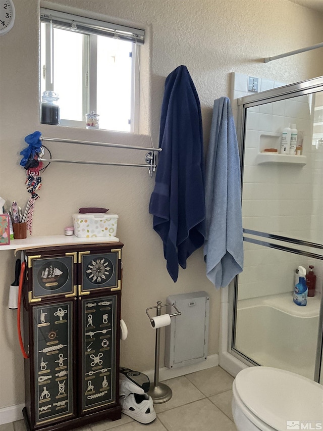 5710 Sarah Rd, Fallon, NV 89406 - full bath with a stall shower, tile patterned floors, and toilet