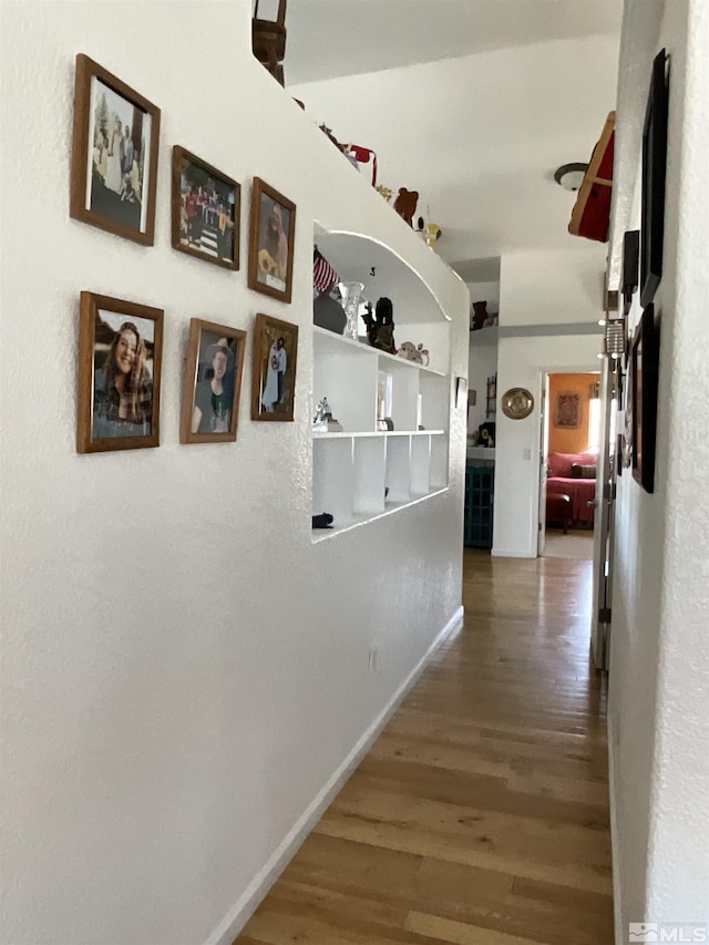 5710 Sarah Rd, Fallon, NV 89406 - hall with wood finished floors and baseboards