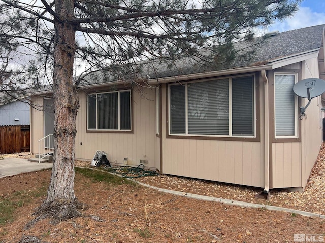 1425 Loma Verde Dr, Sparks, NV 89436 - view of front of house featuring roof with shingles and fence