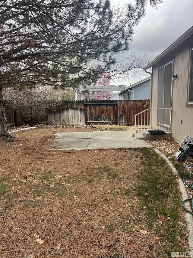 1425 Loma Verde Dr, Sparks, NV 89436 - view of yard with fence and a patio