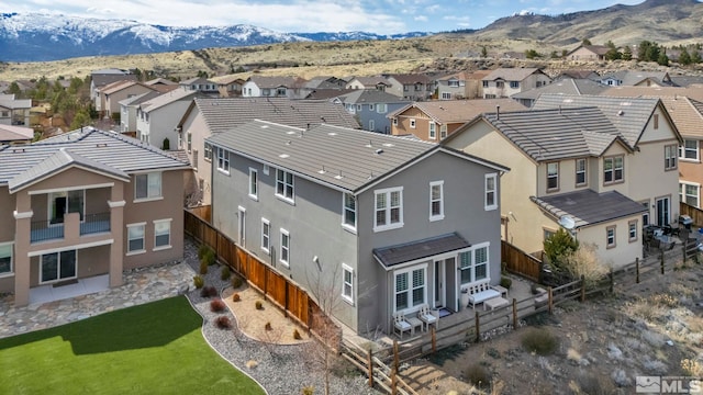 aerial perspective of suburban area featuring mountains