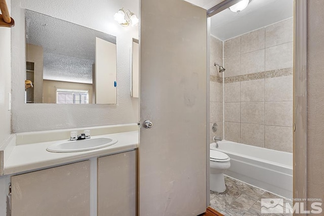 2375 Tripp Dr, Reno, NV 89512 - full bathroom with toilet, shower / bathtub combination, and vanity