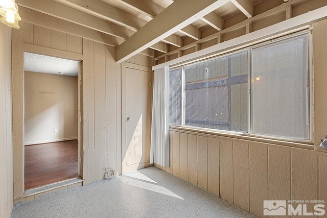 2375 Tripp Dr, Reno, NV 89512 - spare room with wooden walls