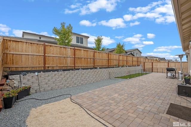 view of patio featuring a fenced backyard