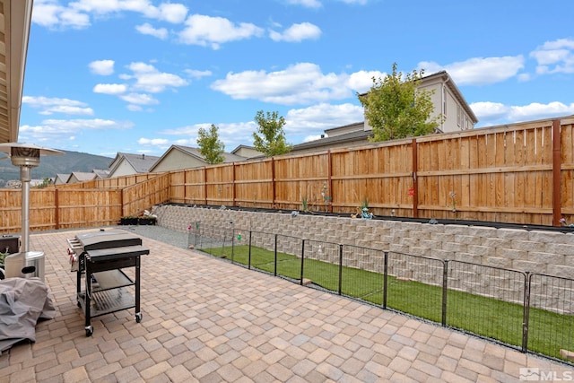 view of patio with a fenced backyard