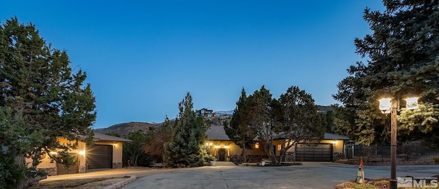 4840 Keshmiri Pl, Reno, NV 89519 - view of property hidden behind natural elements featuring a mountain view