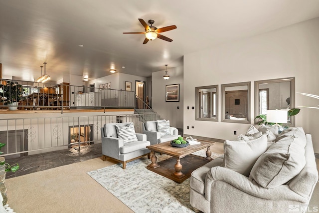4840 Keshmiri Pl, Reno, NV 89519 - living room featuring a ceiling fan, stairs, and a fireplace