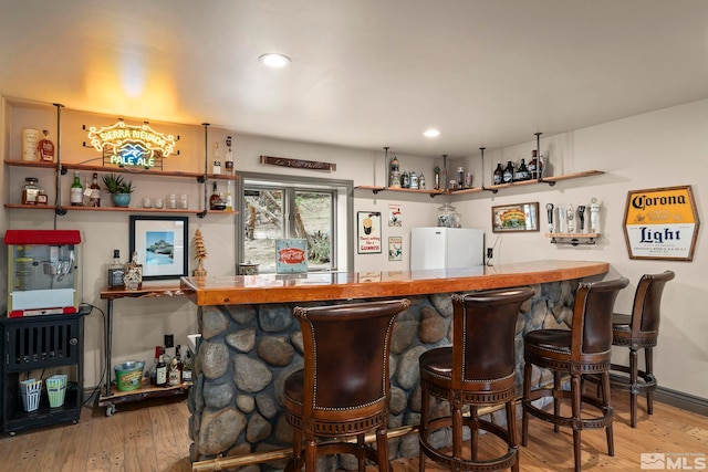 4840 Keshmiri Pl, Reno, NV 89519 - indoor wet bar featuring freestanding refrigerator, hardwood / wood-style floors, and recessed lighting