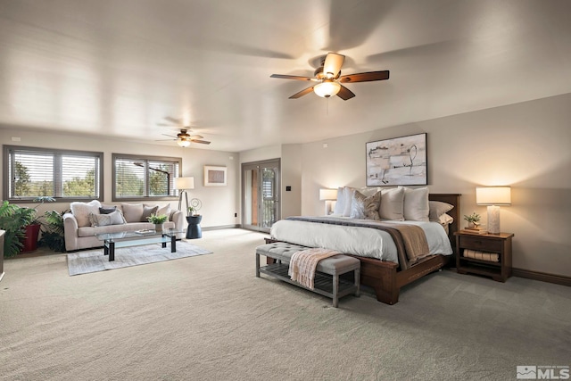 4840 Keshmiri Pl, Reno, NV 89519 - carpeted bedroom with access to exterior, baseboards, multiple windows, and a ceiling fan