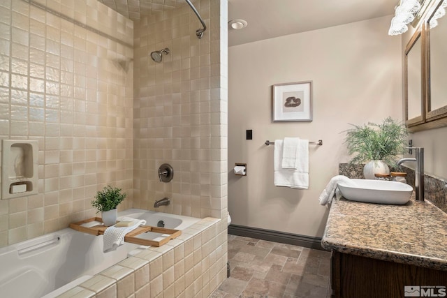 4840 Keshmiri Pl, Reno, NV 89519 - full bath with stone finish flooring, vanity, baseboards, and tiled shower / bath