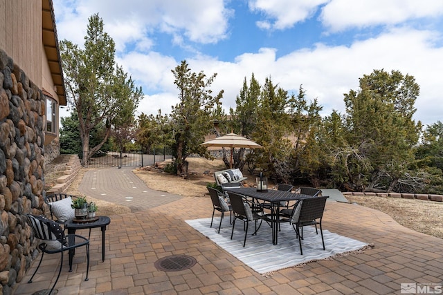 4840 Keshmiri Pl, Reno, NV 89519 - view of patio featuring outdoor dining space and fence
