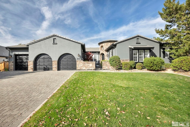view of front of home featuring stucco siding, stone siding, an attached garage, and decorative driveway