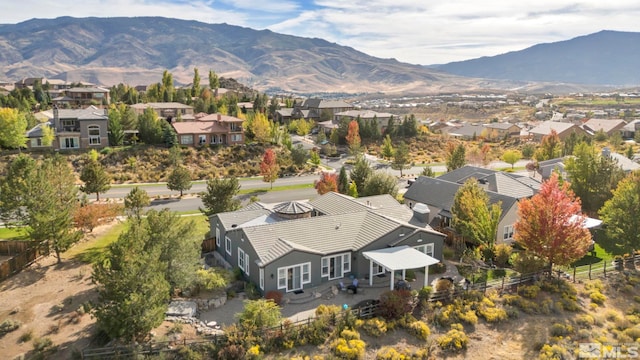 aerial view of residential area with a mountain backdrop