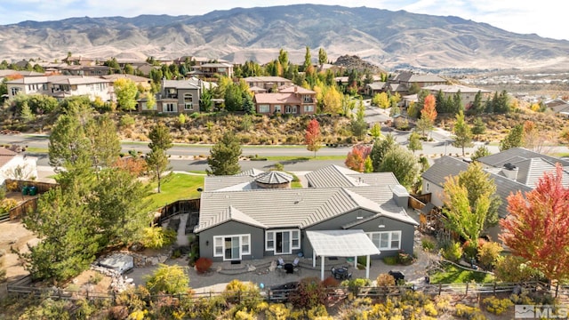 aerial perspective of suburban area featuring mountains