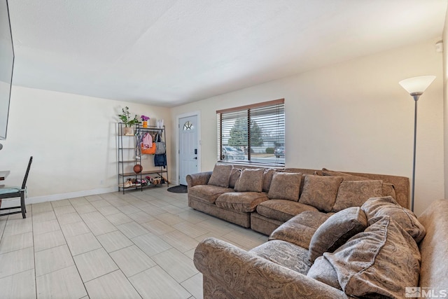 11 E P St, Sparks, NV 89431 - living room featuring baseboards