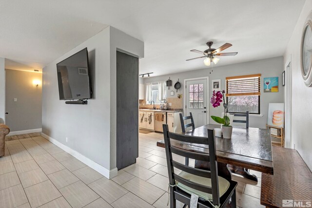 11 E P St, Sparks, NV 89431 - dining space with a ceiling fan and baseboards