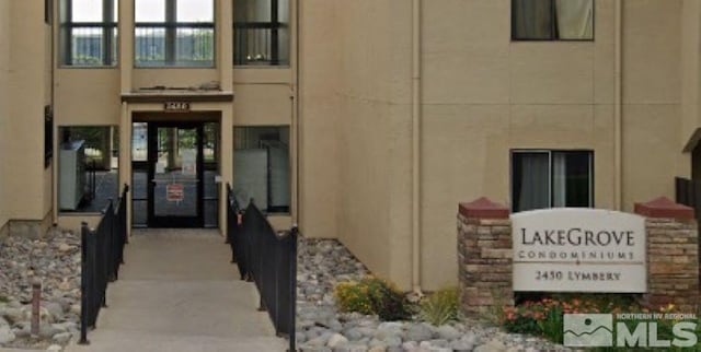 2450 Lymbery St Unit 118, Reno, NV 89509 - doorway to property with stucco siding