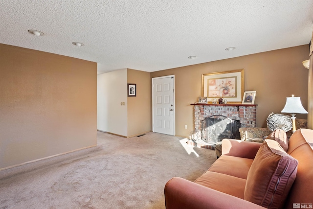 carpeted living area with a fireplace, a textured ceiling, baseboards, and recessed lighting