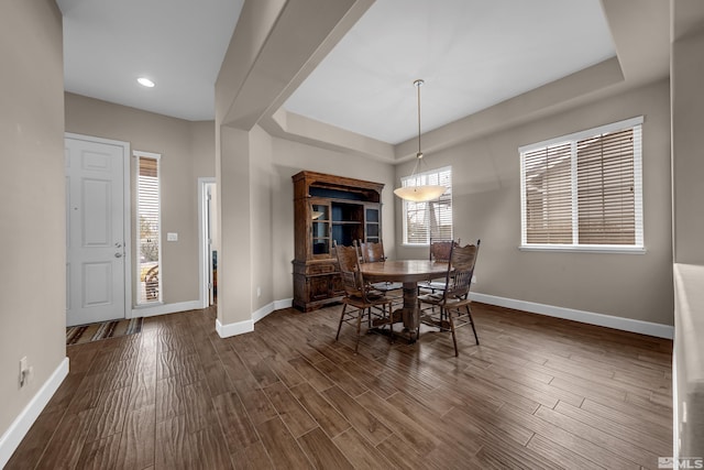 5807 Desert Mirage Dr, Sparks, NV 89436 - dining area with baseboards, dark wood finished floors, a raised ceiling, and recessed lighting