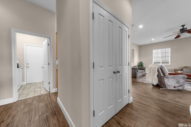 5807 Desert Mirage Dr, Sparks, NV 89436 - hallway with wood finished floors, recessed lighting, and baseboards