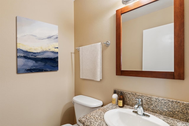 5765 Vista Serena Way Unit 103, Sparks, NV 89436 - half bathroom featuring toilet and vanity