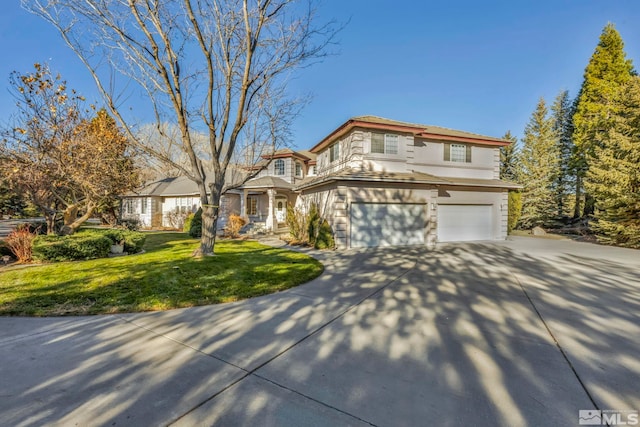 15 Hidden Lake Dr, Reno, NV 89521 - view of front of property featuring an attached garage, driveway, a front lawn, and stucco siding