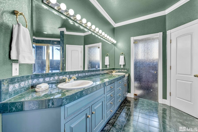 15 Hidden Lake Dr, Reno, NV 89521 - bathroom with crown molding, tile patterned flooring, a textured wall, double vanity, and a stall shower