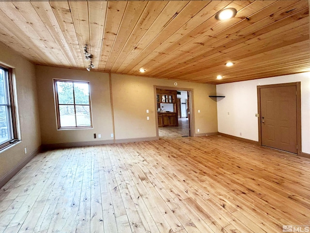 21410 Sazarac Rd, Reno, NV 89521 - empty room with wooden ceiling, light wood finished floors, recessed lighting, and baseboards