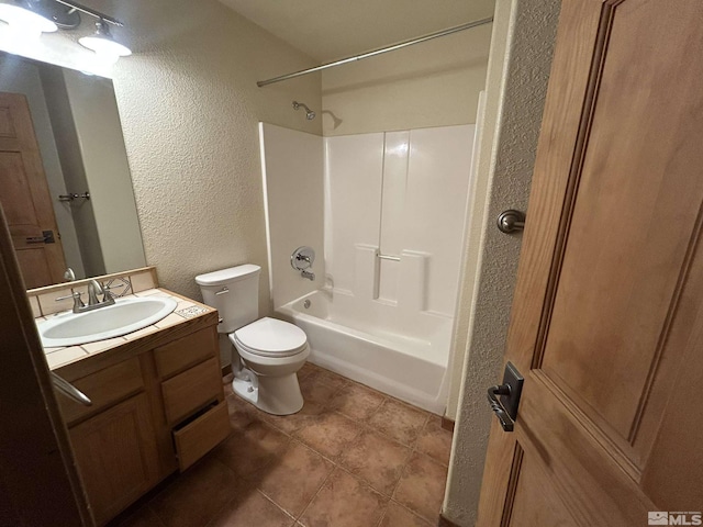 21410 Sazarac Rd, Reno, NV 89521 - bathroom with a textured wall, vanity, toilet, shower / bath combination, and tile patterned flooring