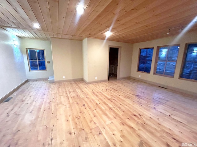 21410 Sazarac Rd, Reno, NV 89521 - spare room featuring light wood-style floors, baseboards, and wood ceiling