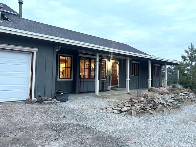 21410 Sazarac Rd, Reno, NV 89521 - rear view of property with a porch and board and batten siding