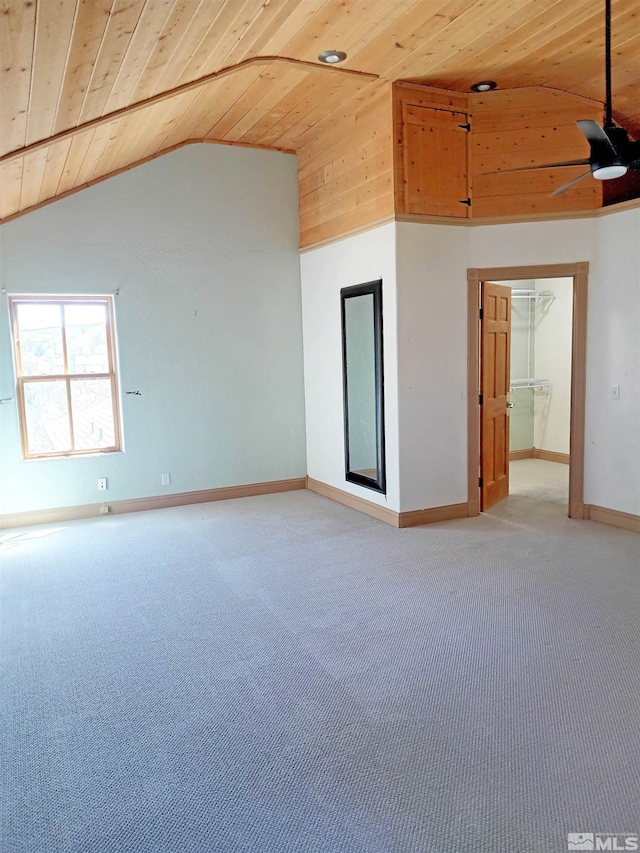 21410 Sazarac Rd, Reno, NV 89521 - spare room with wooden ceiling, vaulted ceiling, carpet floors, a ceiling fan, and baseboards