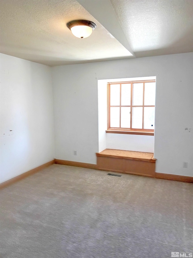 21410 Sazarac Rd, Reno, NV 89521 - carpeted empty room with a textured ceiling and baseboards