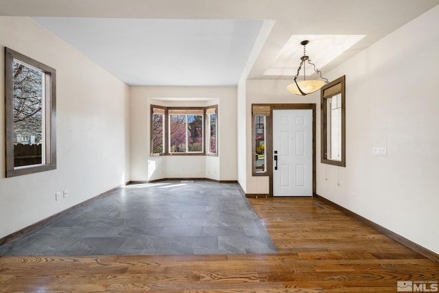 159 River Flow Dr, Reno, NV 89523 - foyer with baseboards and stone finish flooring