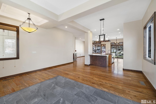 159 River Flow Dr, Reno, NV 89523 - kitchen with open floor plan, dark wood finished floors, decorative light fixtures, baseboards, and recessed lighting