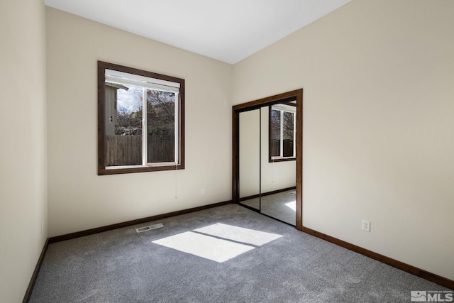 159 River Flow Dr, Reno, NV 89523 - unfurnished bedroom with carpet floors and baseboards