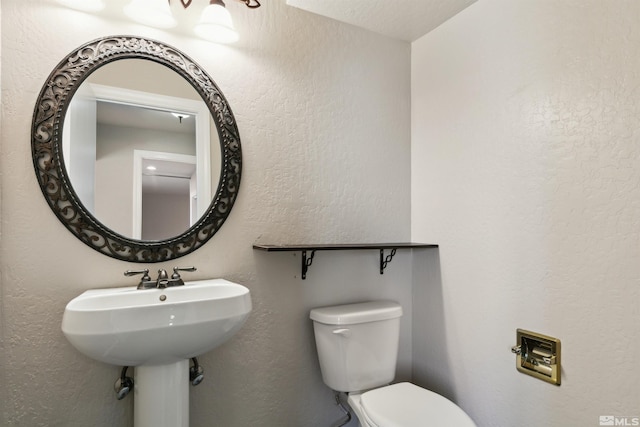 1599 Lucerne, Minden, NV 89423 - bathroom featuring toilet and a textured wall