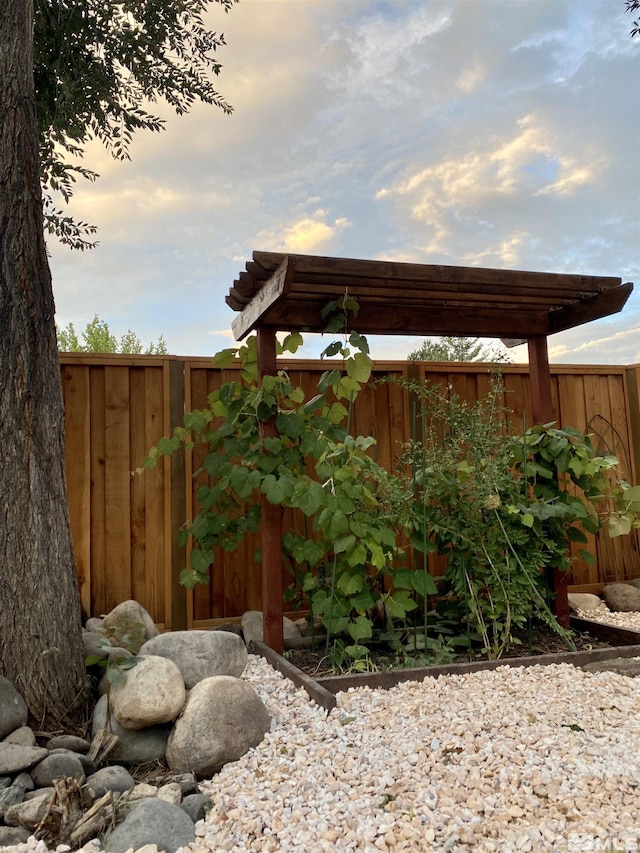 1599 Lucerne, Minden, NV 89423 - yard at dusk with fence