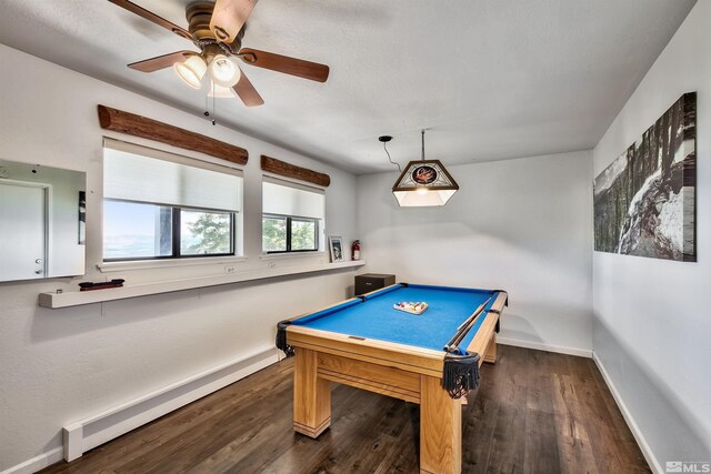 245 Tramway Dr, Stateline, NV 89449 - recreation room featuring baseboards, wood finished floors, pool table, ceiling fan, and a baseboard radiator