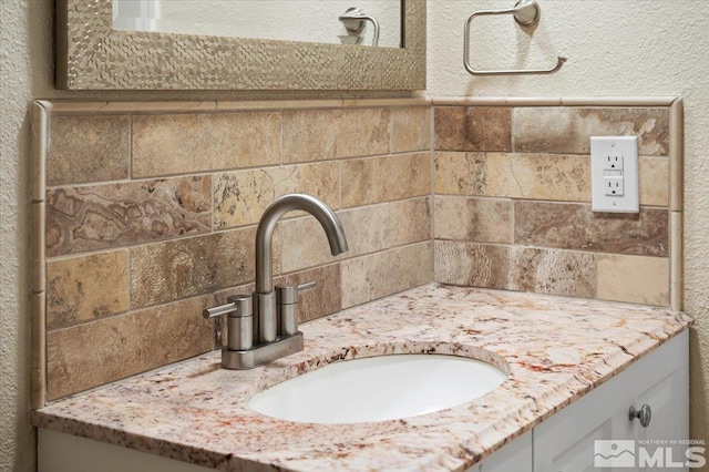 4550 Noche Ln, Reno, NV 89502 - bathroom view of vanity and decorative backsplash
