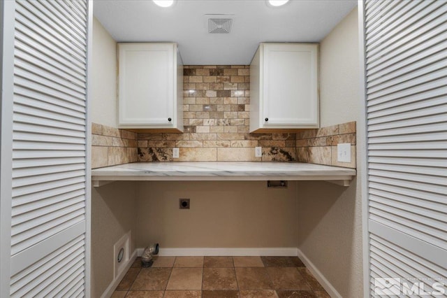 4550 Noche Ln, Reno, NV 89502 - laundry area with cabinet space and electric dryer hookup