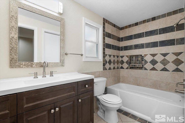 4550 Noche Ln, Reno, NV 89502 - full bathroom featuring toilet, vanity, tile patterned floors, tile walls, and bathtub / shower combination