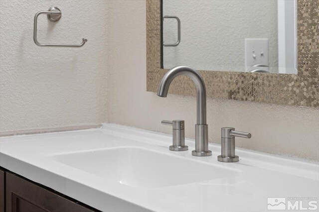 4550 Noche Ln, Reno, NV 89502 - bathroom view of a textured wall and vanity