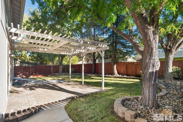 4550 Noche Ln, Reno, NV 89502 - view of yard featuring a patio and a pergola
