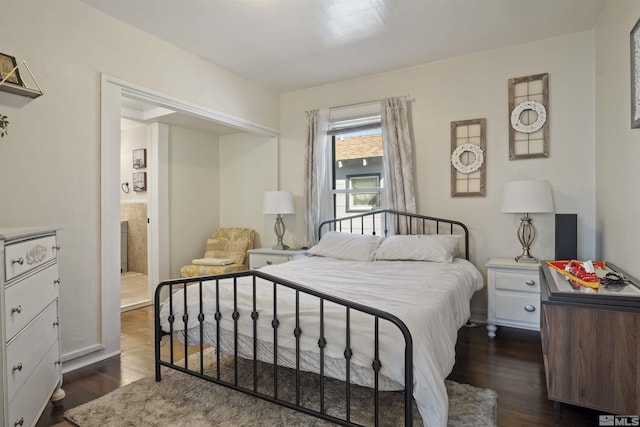 529 11th St, Sparks, NV 89431 - bedroom with dark wood-type flooring and baseboards