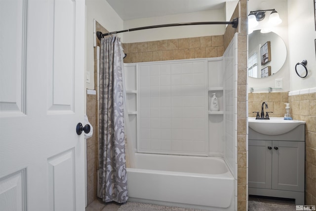 529 11th St, Sparks, NV 89431 - bathroom featuring tile walls, vanity, shower / tub combo, and wainscoting